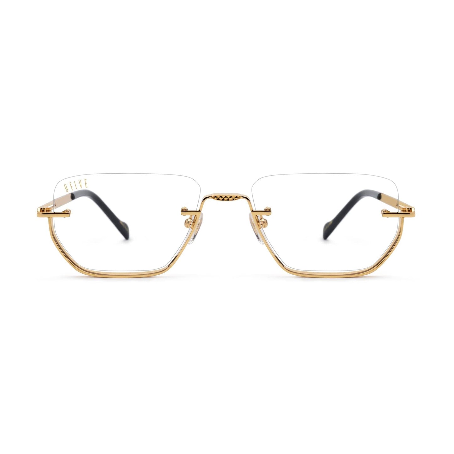Gold-framed eyeglasses on a white background