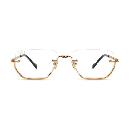 Gold-framed eyeglasses on a white background